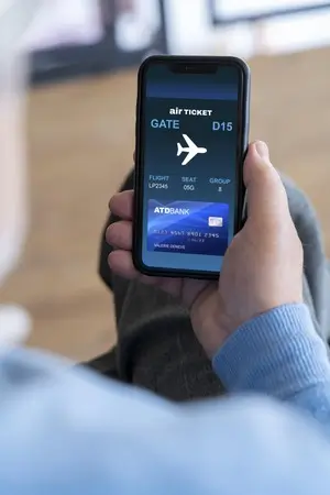 Traveler booking a flight ticket by phone with a BookFlightPro.com agent
